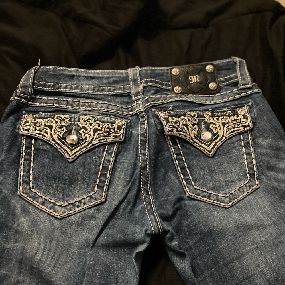 Miss Me jeans with back detail size 27 inseam 31 straight fit.